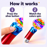 Step 1: press the silver button on the blue collar. Step 2: watch the colorful lights spin inside the clear globe.