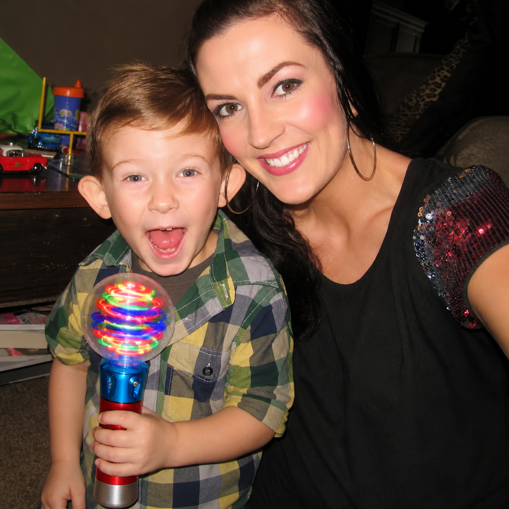 Jennifer and Noah holding the Mimsy Glow & Spin Sensory Wand
